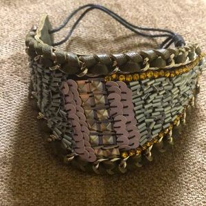 Hand made bracelet from Brasil. All beads and leather. Comes in pouch.